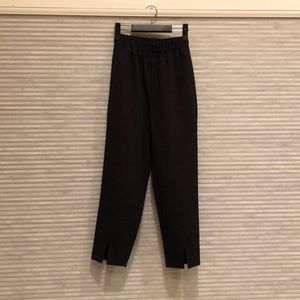 Black relaxed trousers